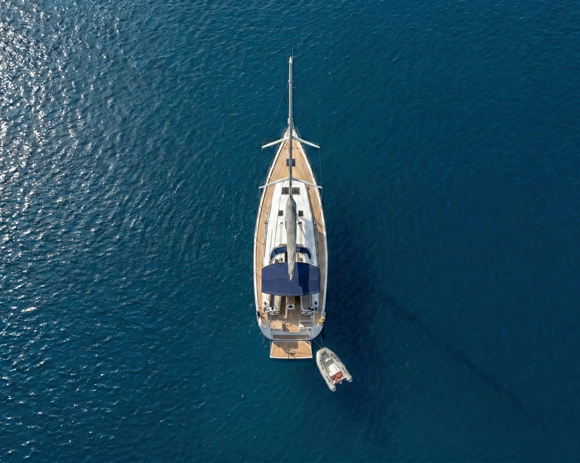 Aerial view of yacht on open ocean